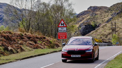 Skoda Superb Estate - front, driving