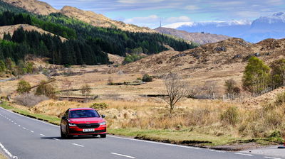 Skoda Superb Estate - front, driving