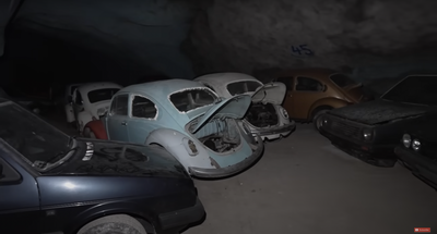 Abandoned classic Volkswagens in a mine