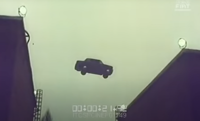A Fiat 131 jumps between rooftops in a 1970s advert